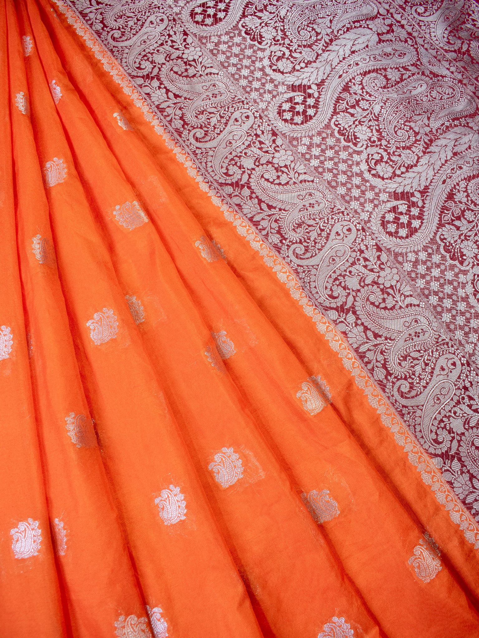 Banarasi Semi Chiffon Saree Silver Zari Buti Weaving With Contrast Border- Orange