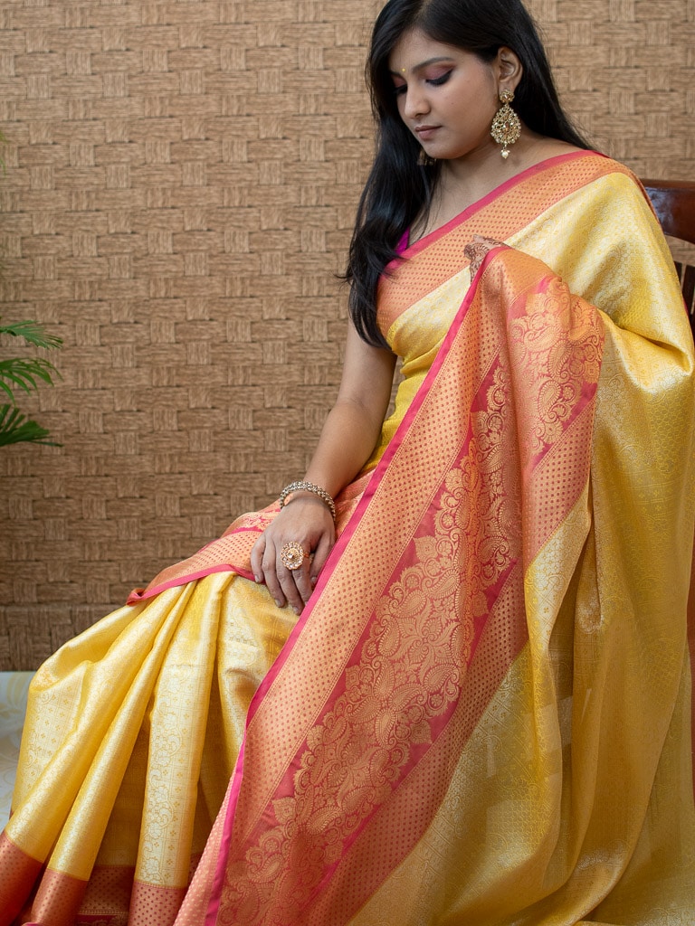 Banarasi Kora Muslin Saree With Tanchoi Weaving & Contrast Skirt Border-Yellow & Pink