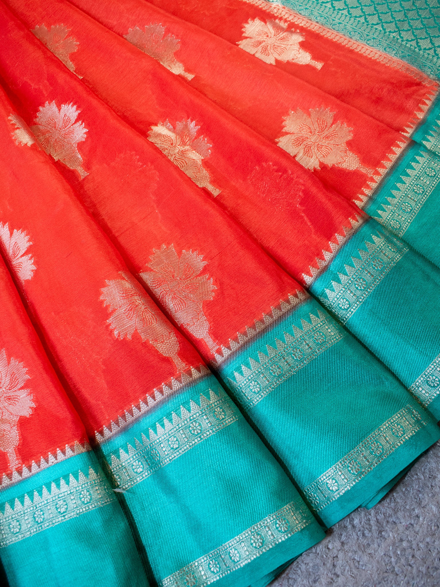 Banarasi Semi Silk Saree With Floral Zari Weaving & Contrast Border -Orange