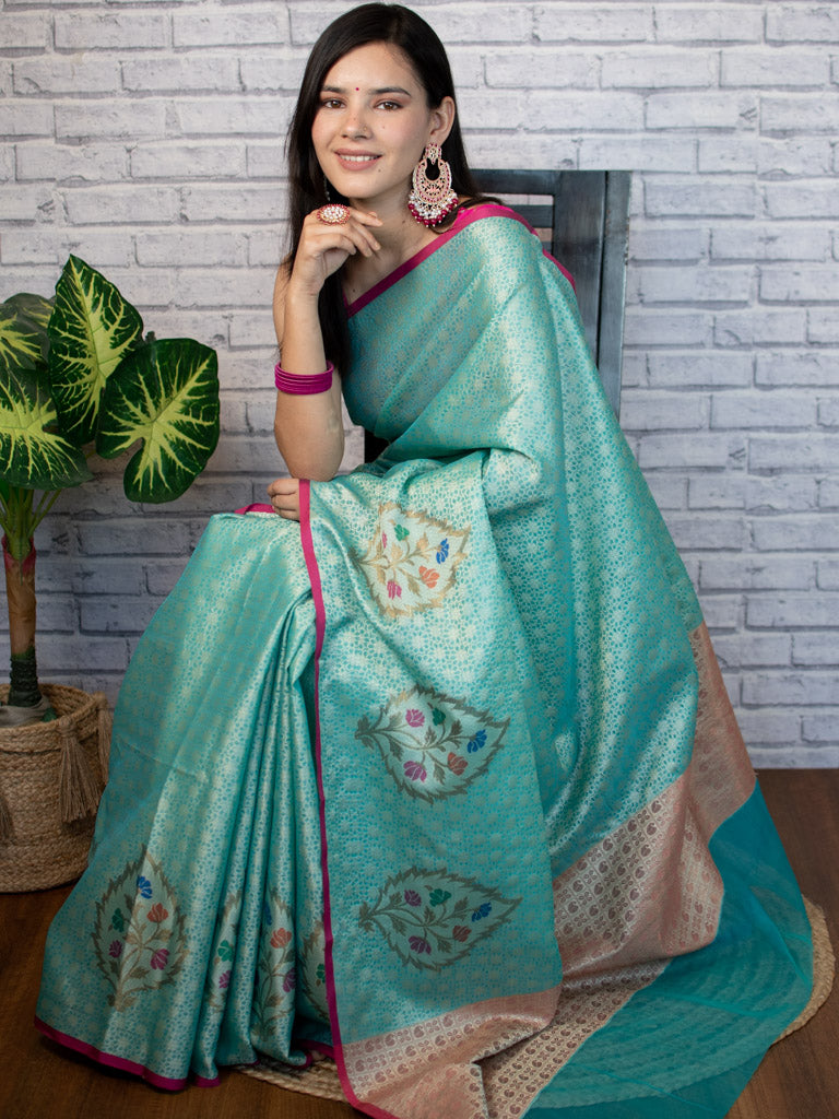 Banarasi Kora Muslin Saree With Tanchoi Weaving and Floral Border-Aqua Blue