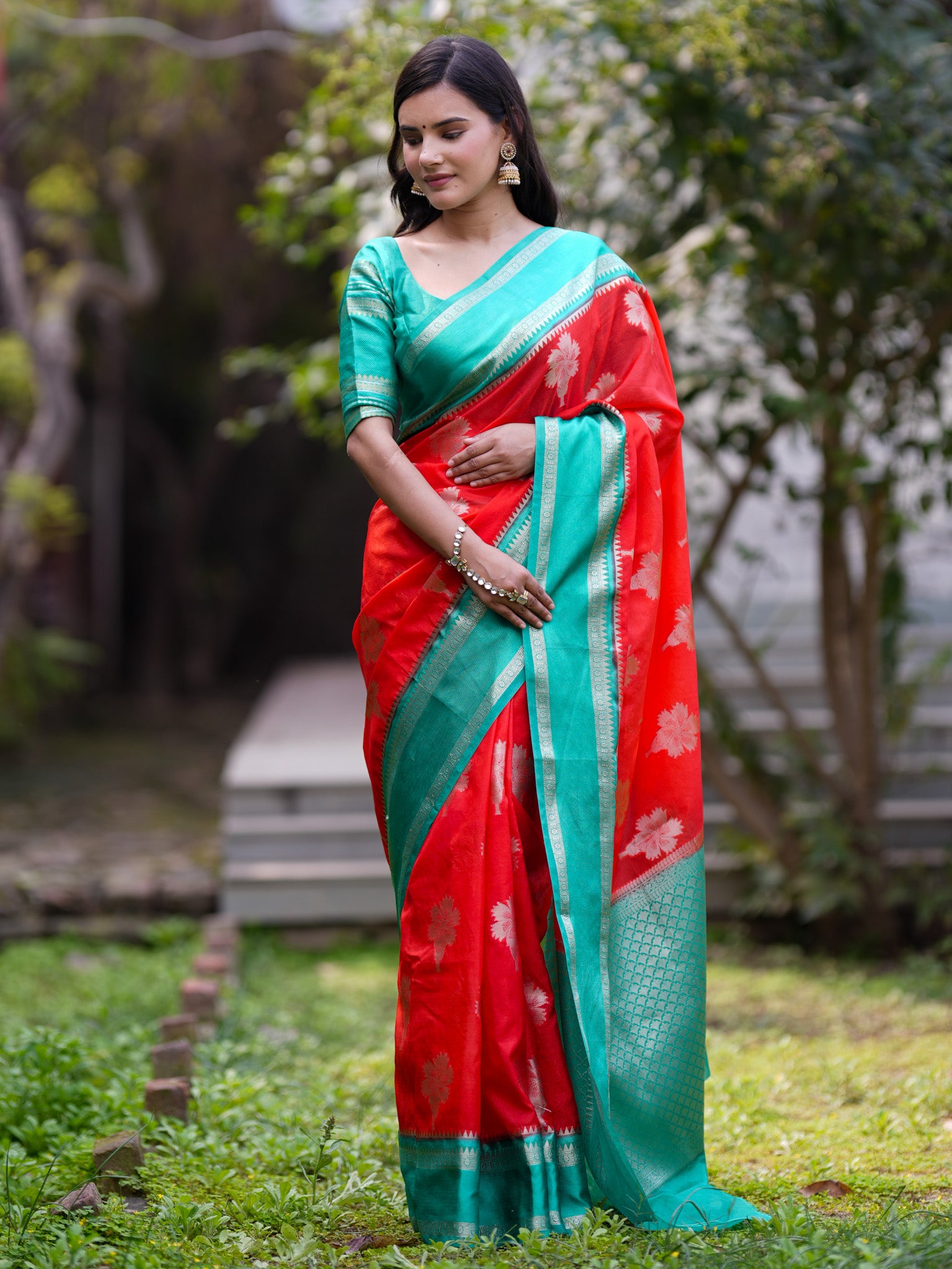 Banarasi Semi Silk Saree With Floral Zari Weaving & Contrast Border -Orange