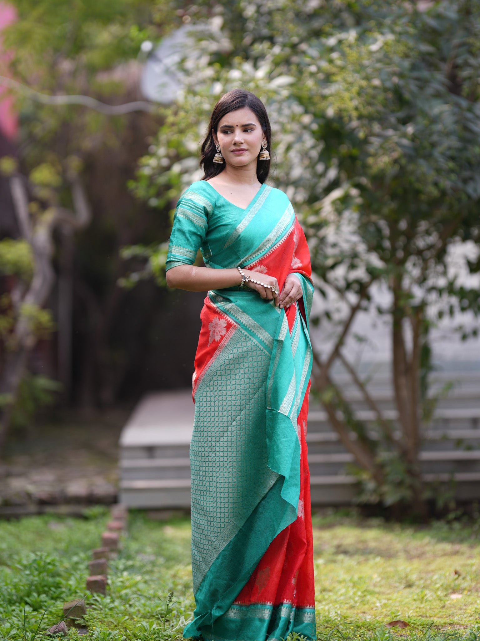 Banarasi Semi Silk Saree With Floral Zari Weaving & Contrast Border -Orange