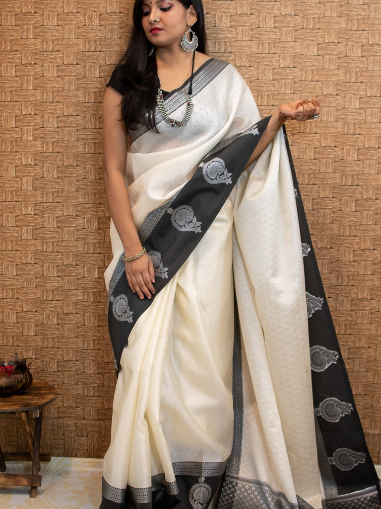 Banarasi Kora Muslin Saree With Tanchoi Weaving & Contrast  Border-Off White & Black