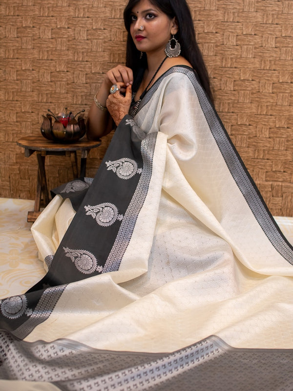 Banarasi Kora Muslin Saree With Tanchoi Weaving & Contrast  Border-Off White & Black