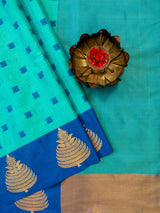 Banarasi Kora Muslin Saree With Tanchoi Weaving Contrast Floral Border-Aqua Blue