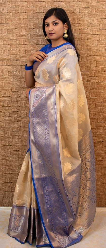 Banarasi Semi Silk Saree With Contrast Floral Buti Weaving Border-Ivory White