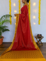 Banarasi Pure Georgette Saree With Antique Zari Buti Weaving & Contrast Border-Red & Yellow