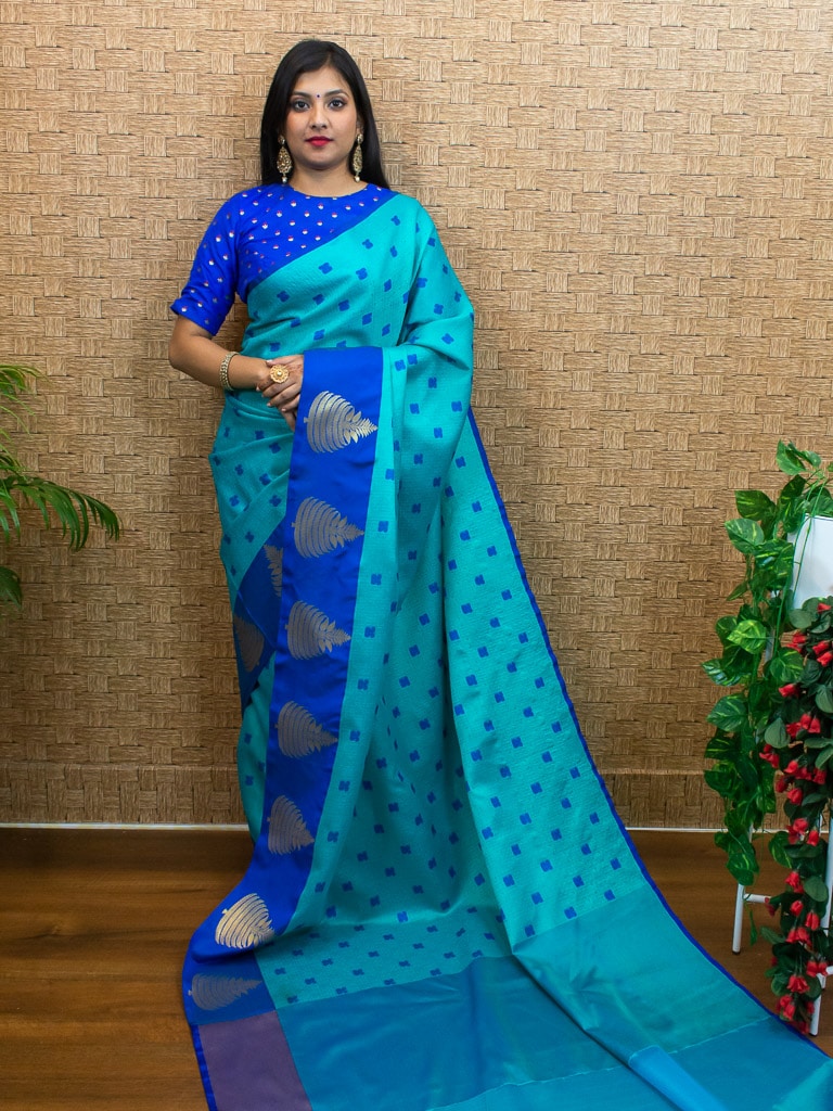 Banarasi Kora Muslin Saree With Tanchoi Weaving Contrast Floral Border-Aqua Blue